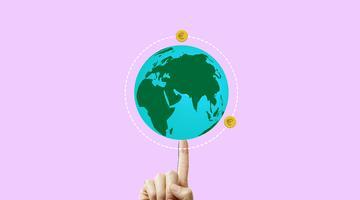 World spinning over a finger with circular coins around.